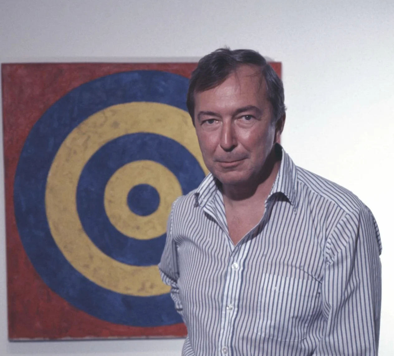 Jasper Johns in front of Target, 1961, at Jasper Johns 1977 Retrospective at the Whitney Museum of American Art, photograph by Jack Mitchell